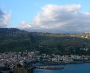 Etna looms over Mediterranean resort towns.jpg